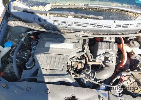 2006 Honda Civic Hybrid z USA, uszkodzony, nr VIN JHMFA36236S017128